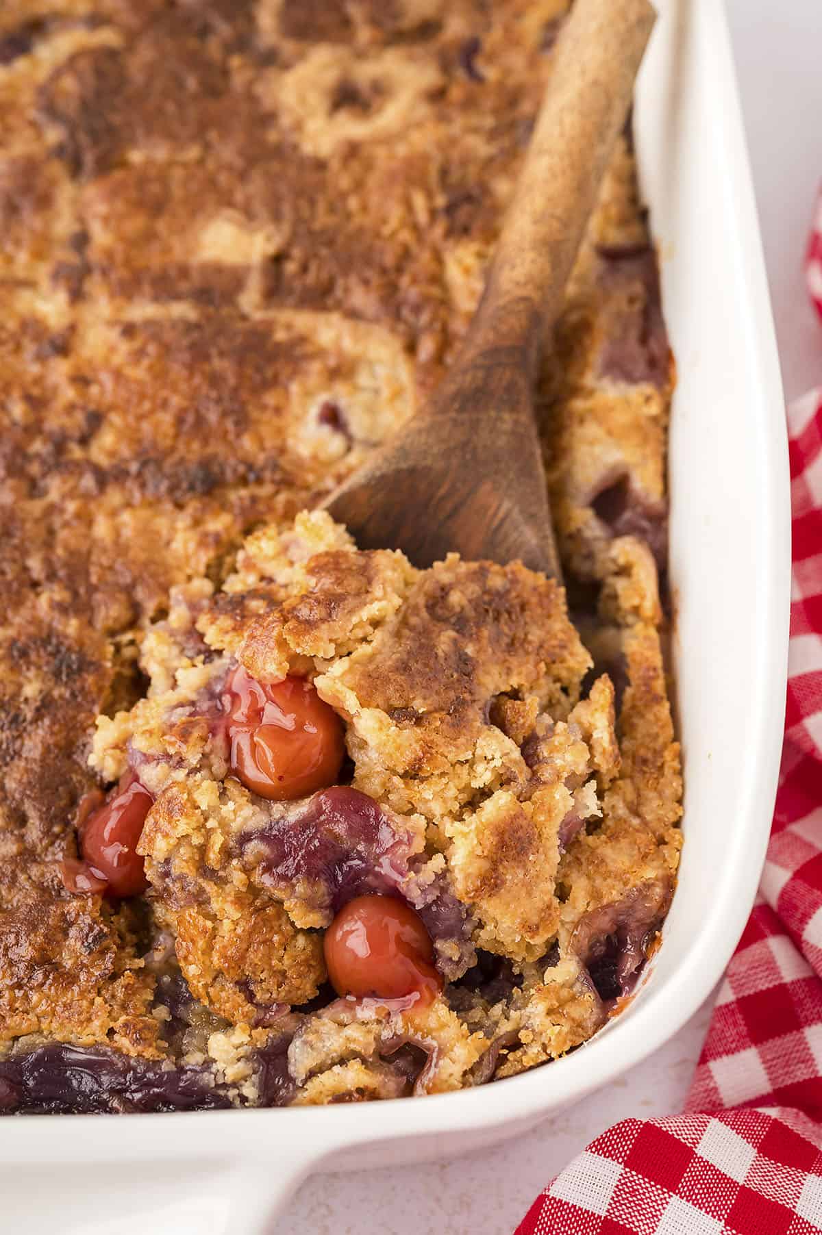 Cherry Pineapple dump cake in baking dish.