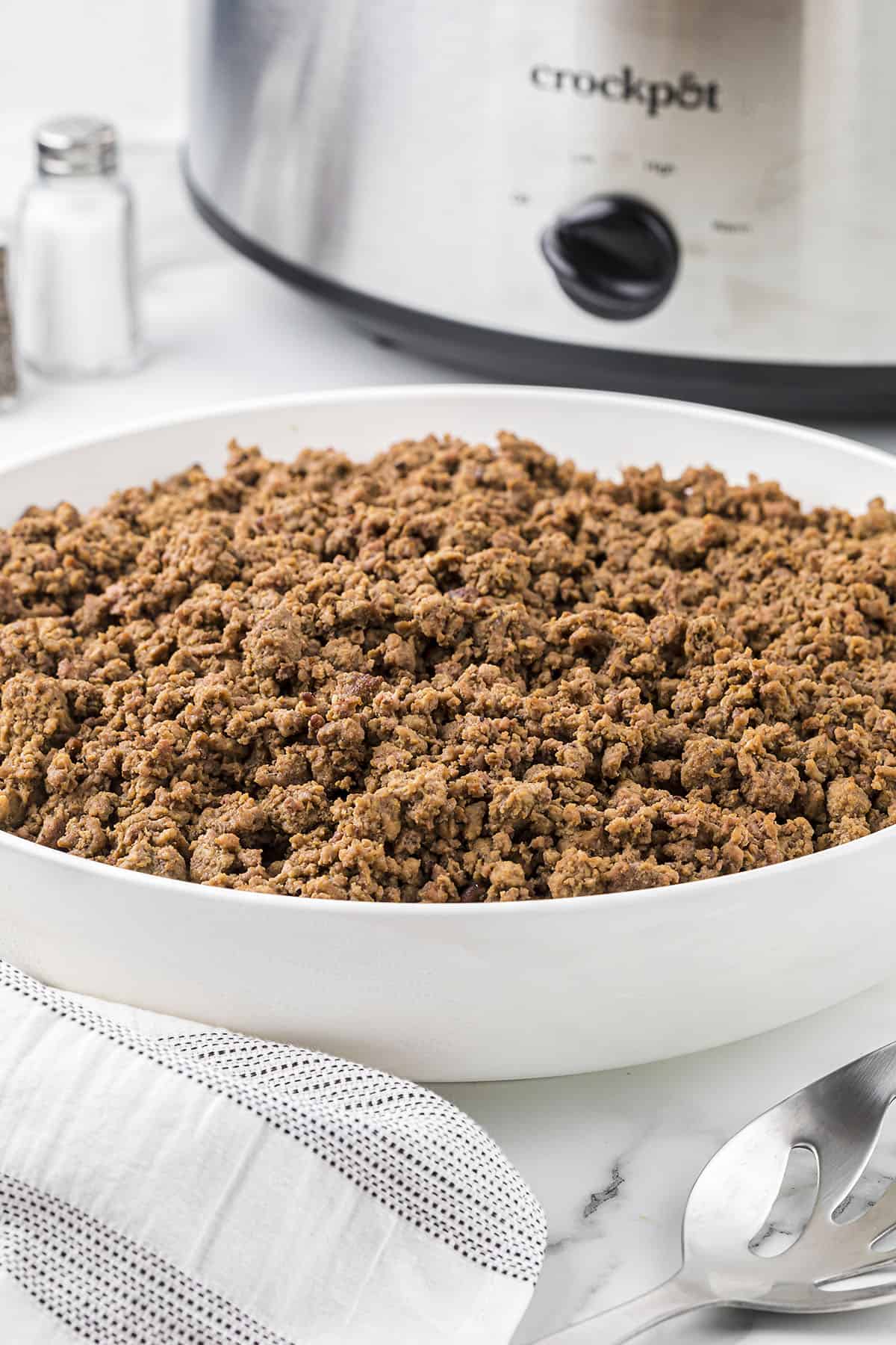 Bowl full of ground beef that was cooked in the slow cooker.