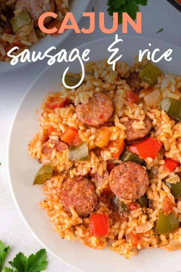 Sausage and rice skillet recipe on white plate.