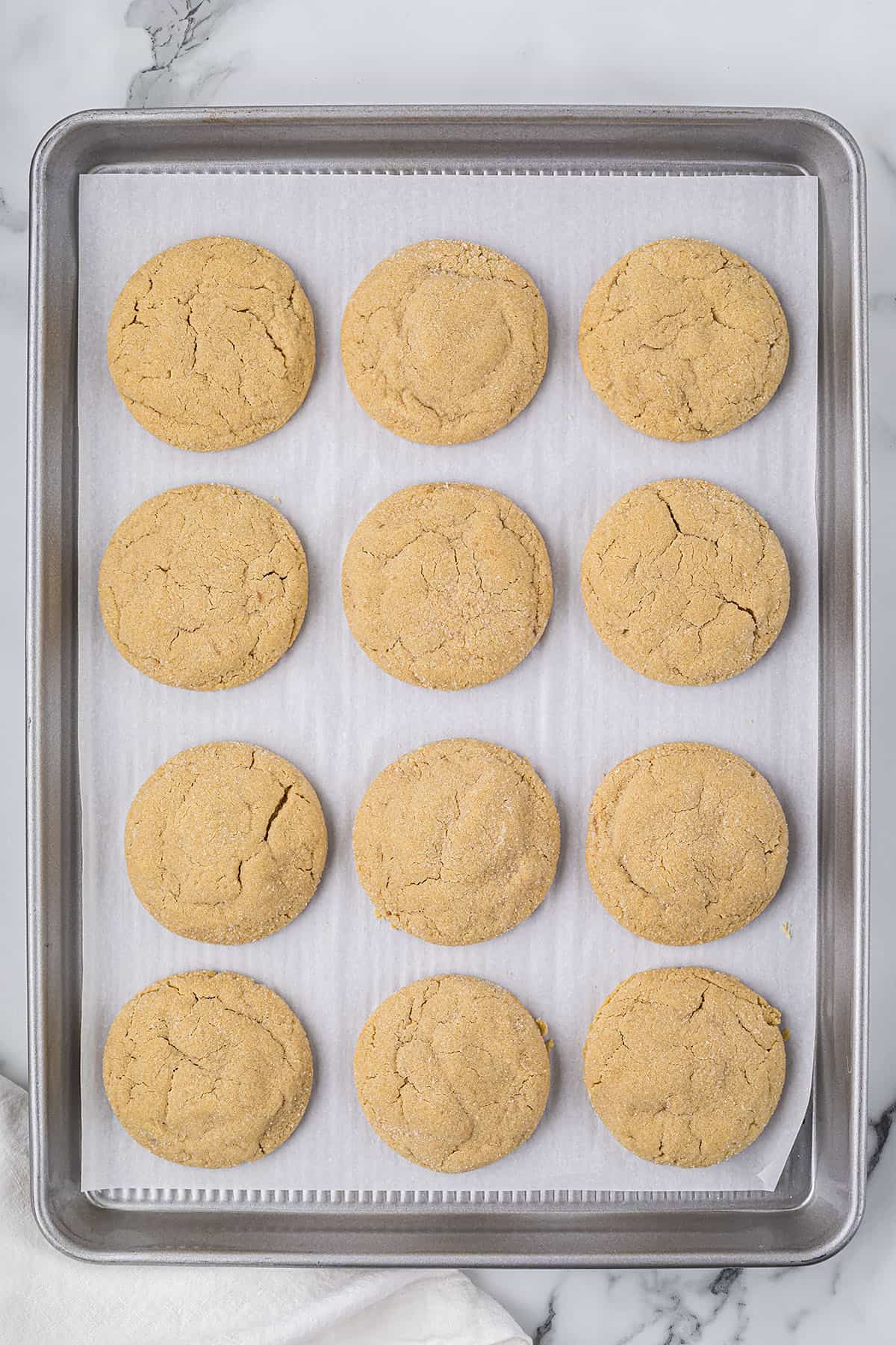 Nutella stuffed cookies on cookie pan.