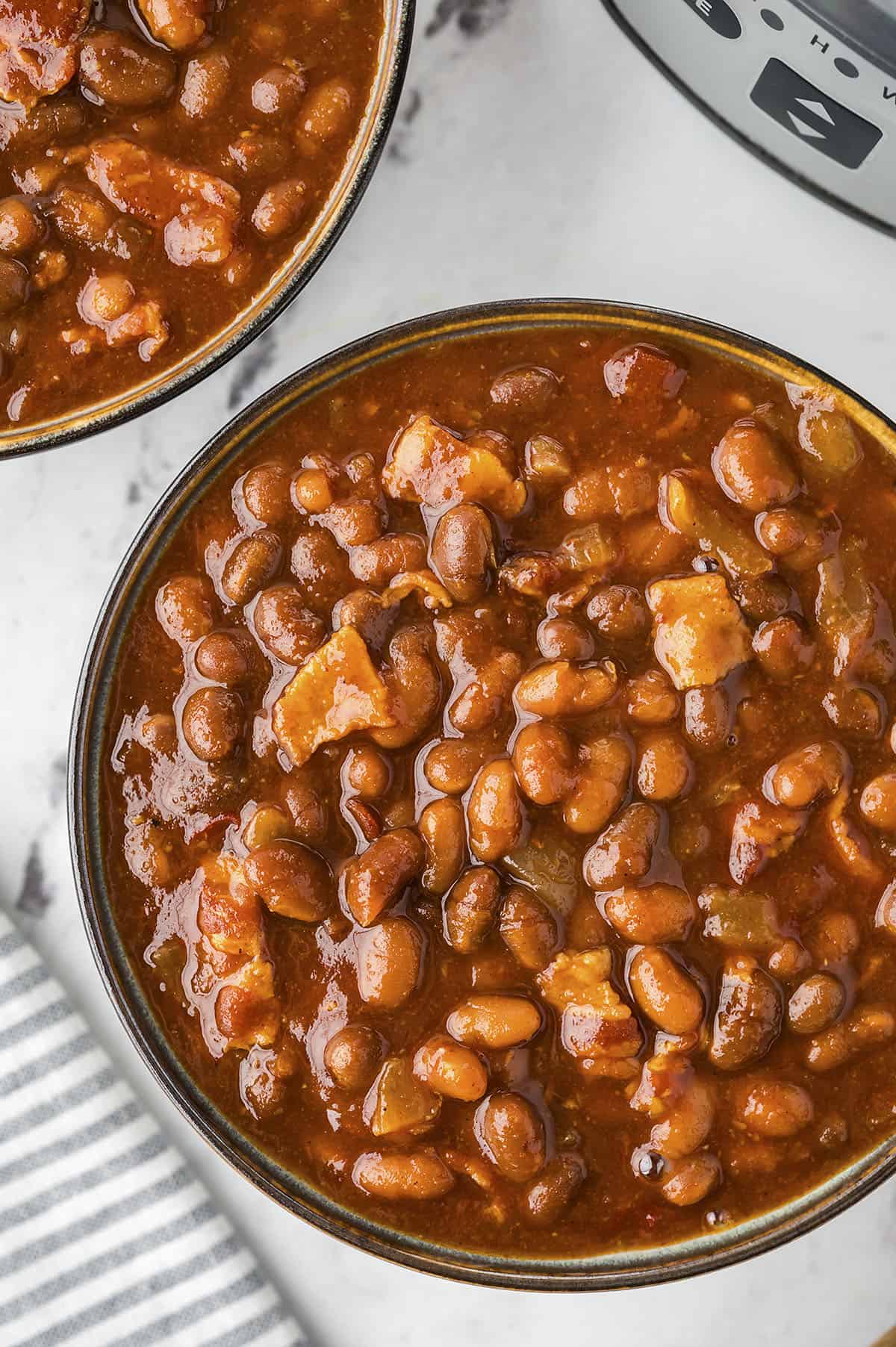 Baked beans in small bowl.