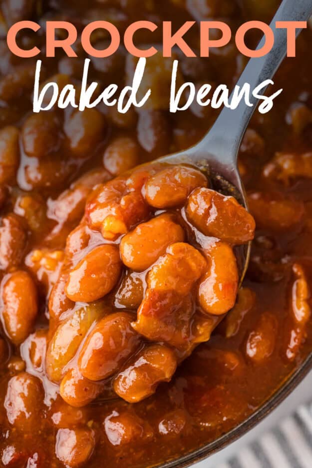 Crockpot baked beans on spoon.