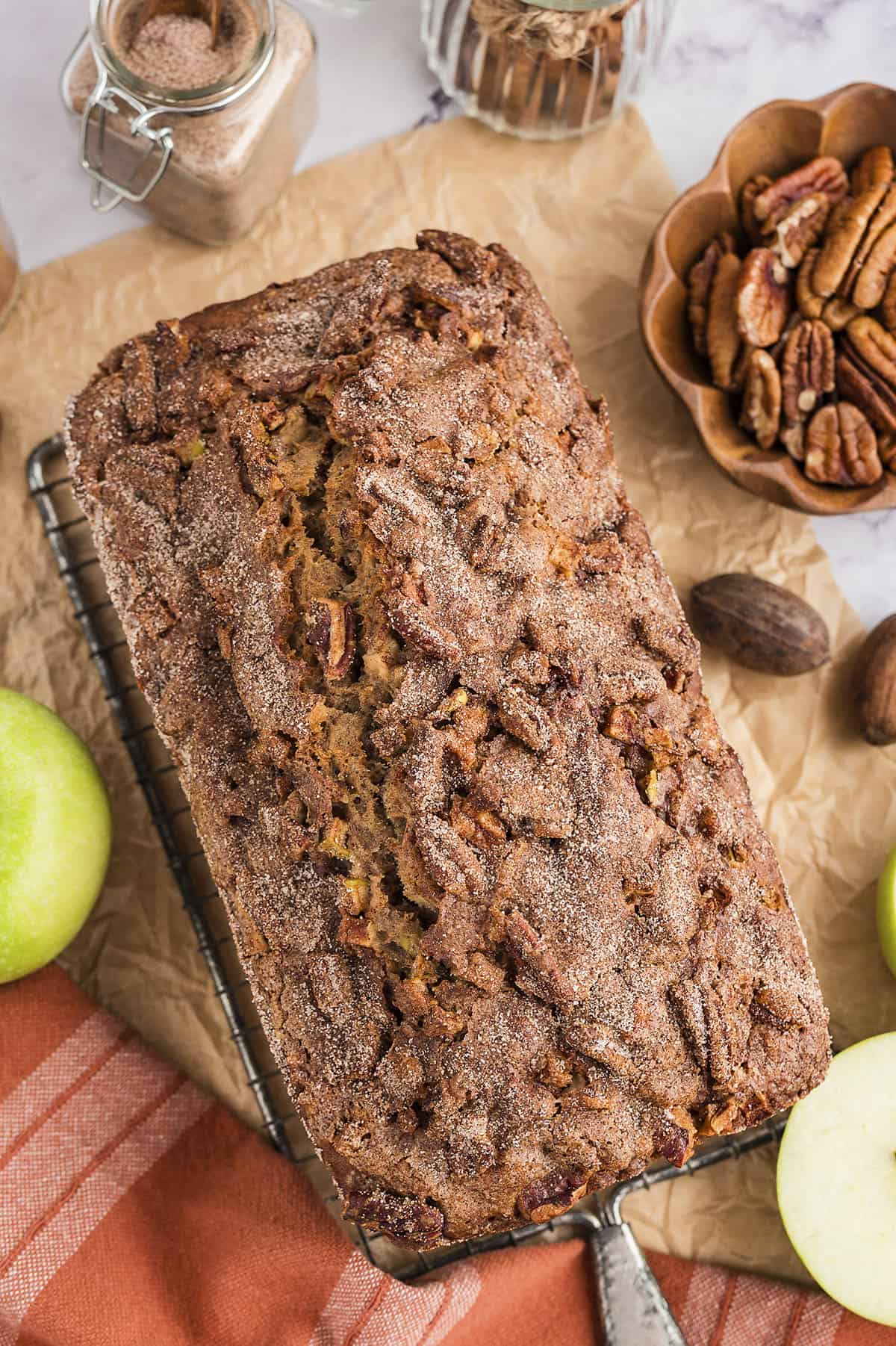 Cinnamon sugar apple bread recipe on cooling rack.