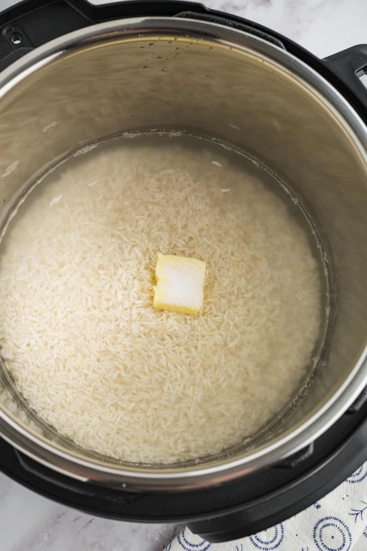 Rice in Instant Pot with butter and water.