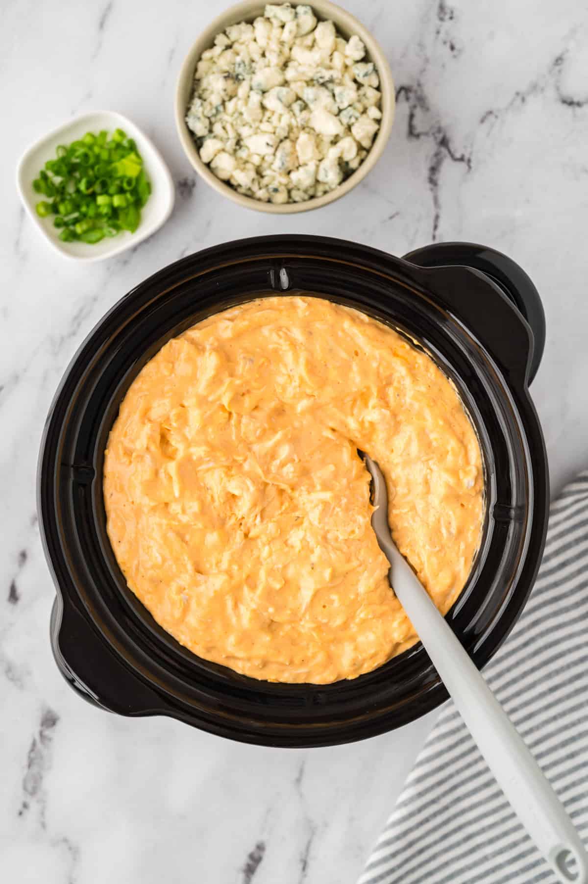 Warm buffalo wing dip in crockpot.