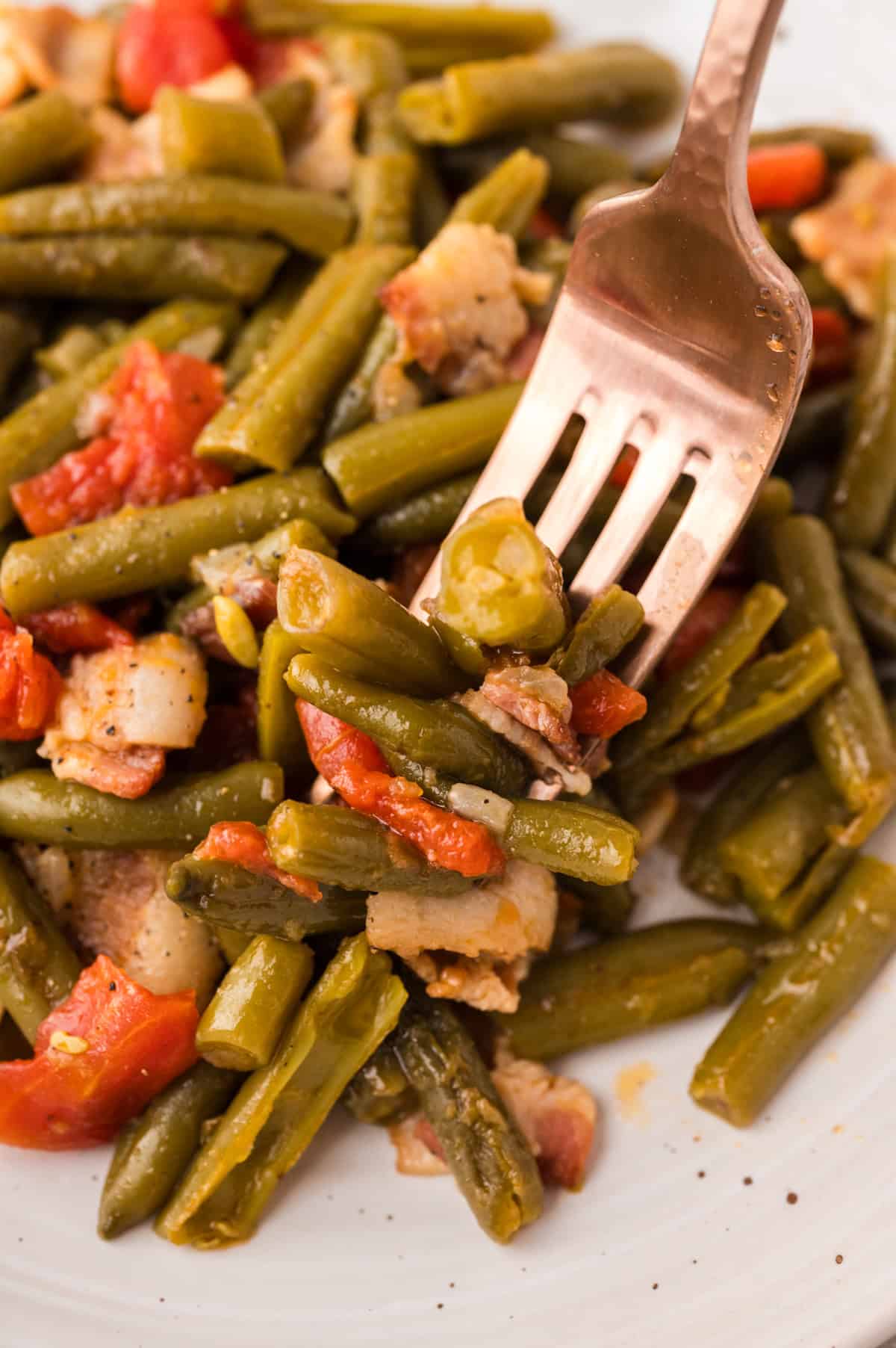 Green beans on plate with fork.