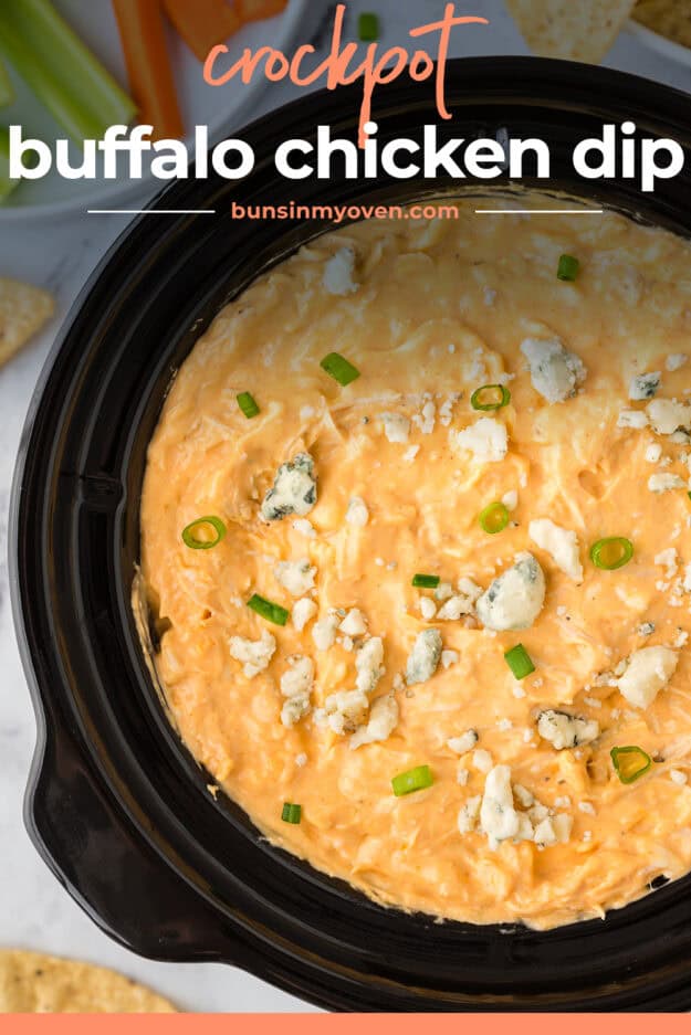 Crockpot buffalo chicken wing dip topped with blue cheese crumbles.