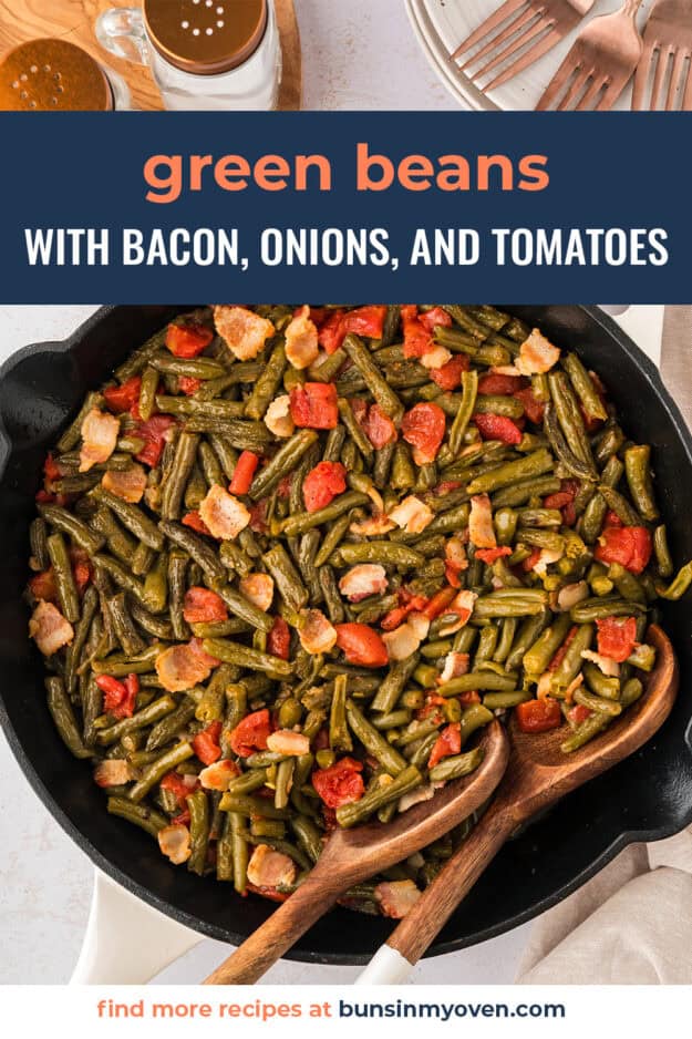 Green beans with bacon and tomatoes in skillet.