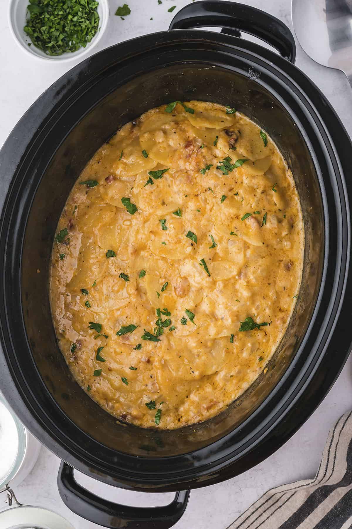 Slow cooker scalloped potatoes with ham.