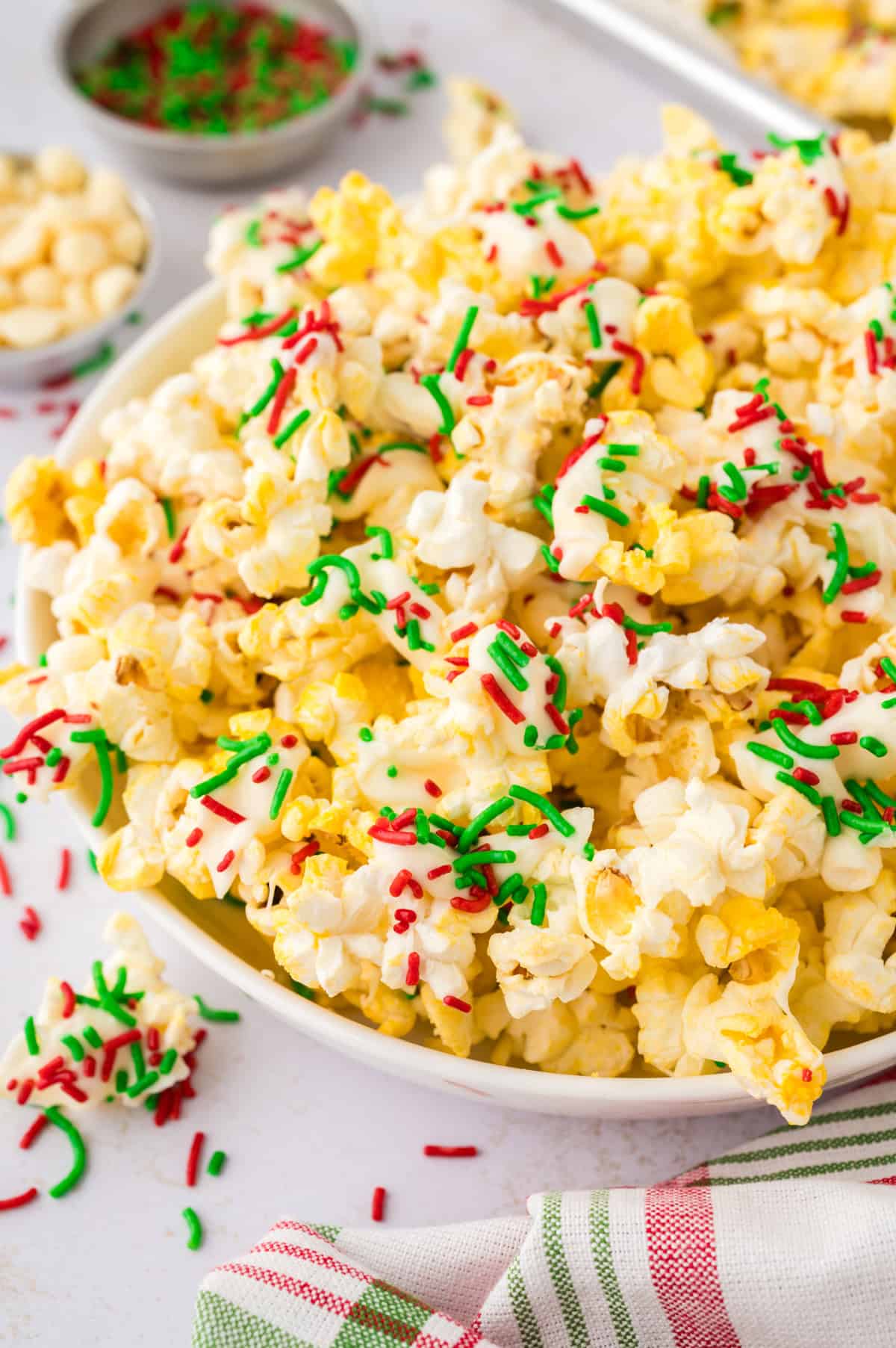 Christmas popcorn in white bowl.