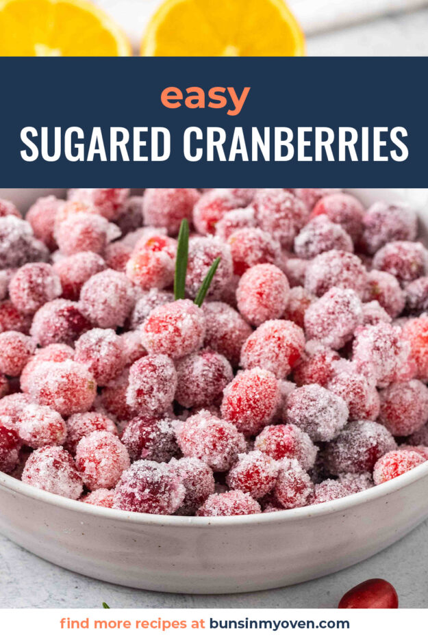 Sugared cranberries in white bowl.