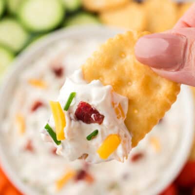 Bacon cheddar ranch dip on cracker.