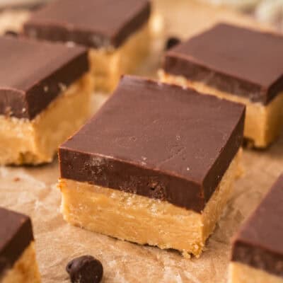 Slices of chocolate peanut butter fudge on counter.