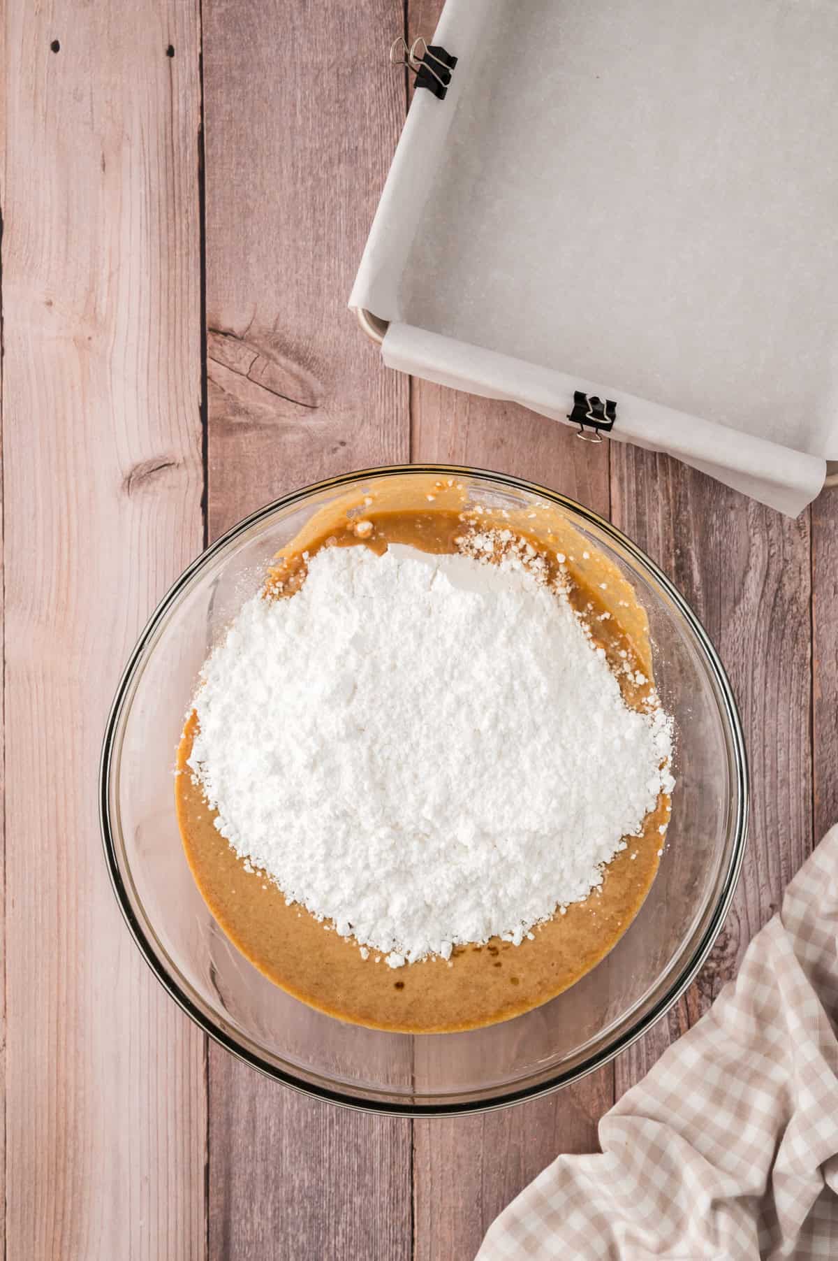 Powdered sugar in bowl with peanut butter.