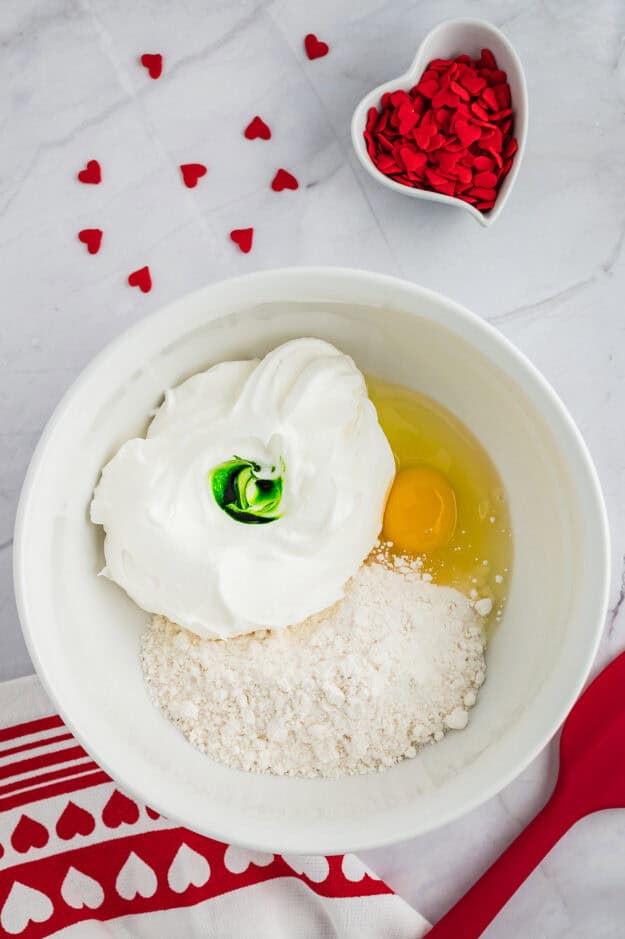 Ingredients for Grinch cookies in mixing bowl.