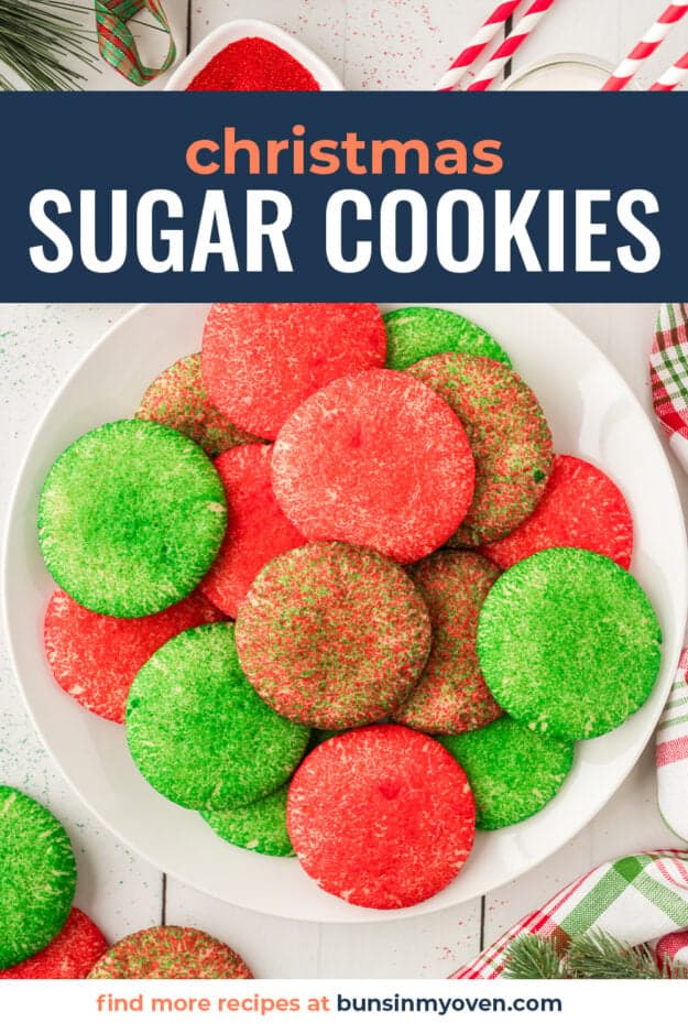 Christmas sugar cookies on white plate.