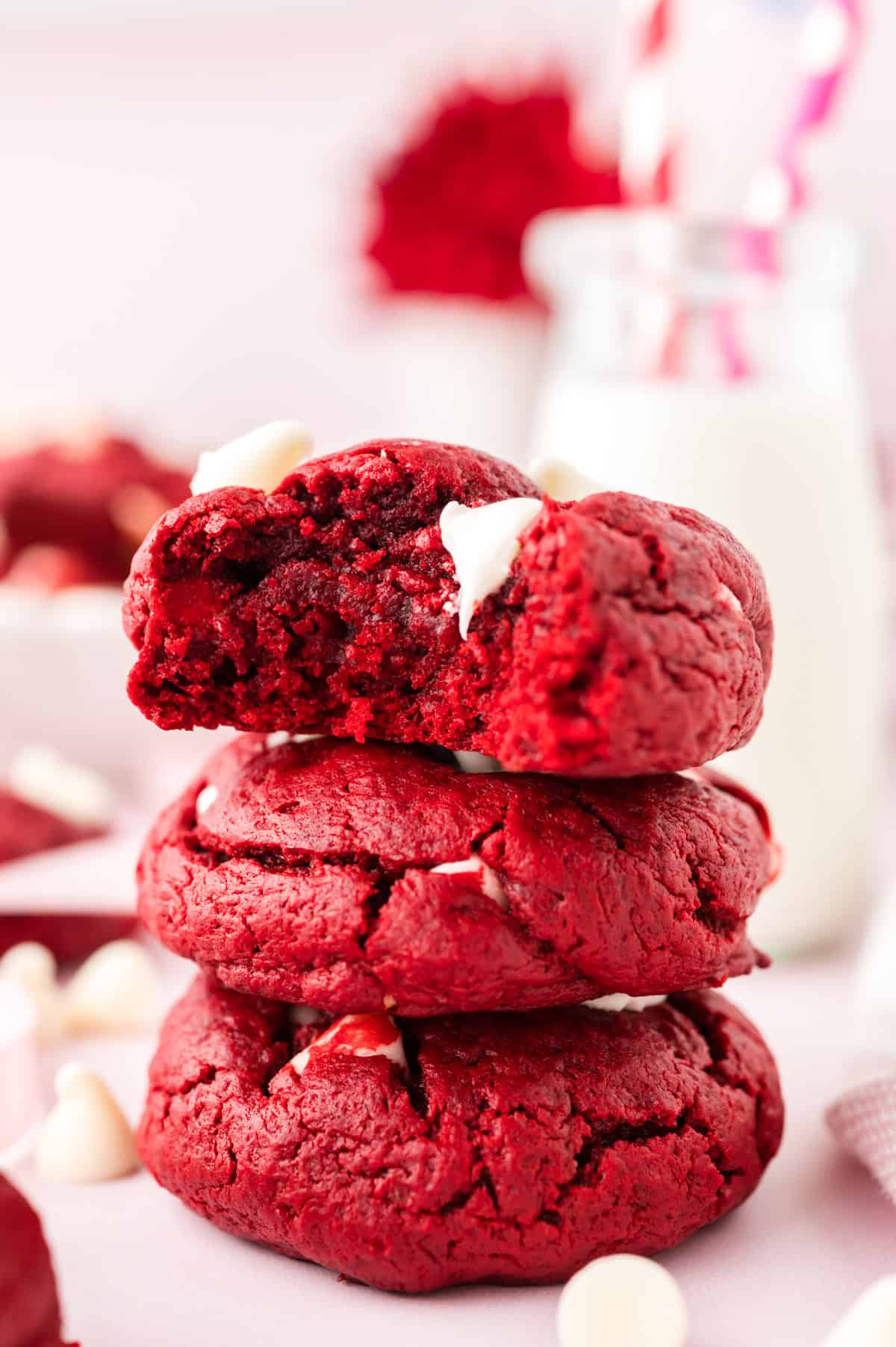 Thick and chewy red velvet cake cookie stacked up.