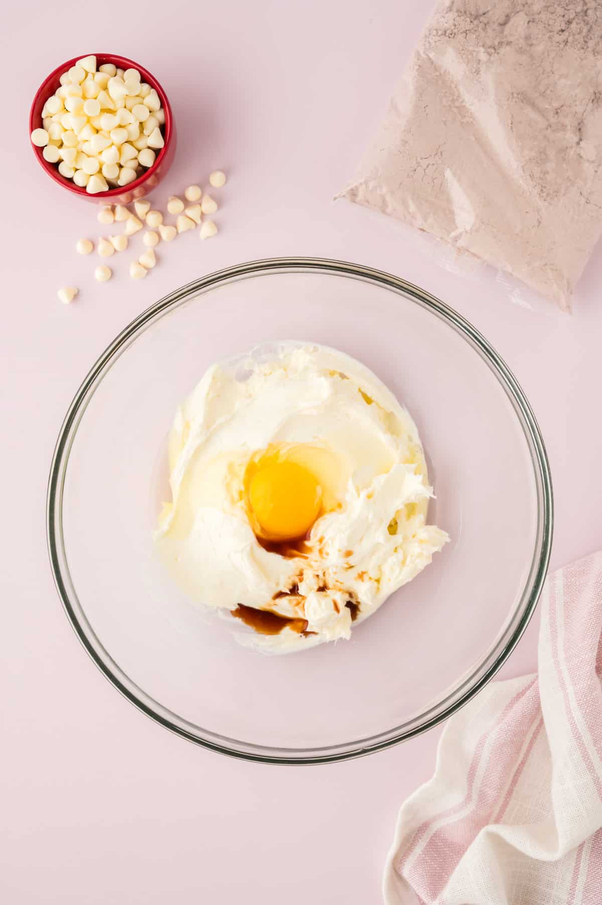 Cream cheese, butter, and egg beaten together in mixing bowl.