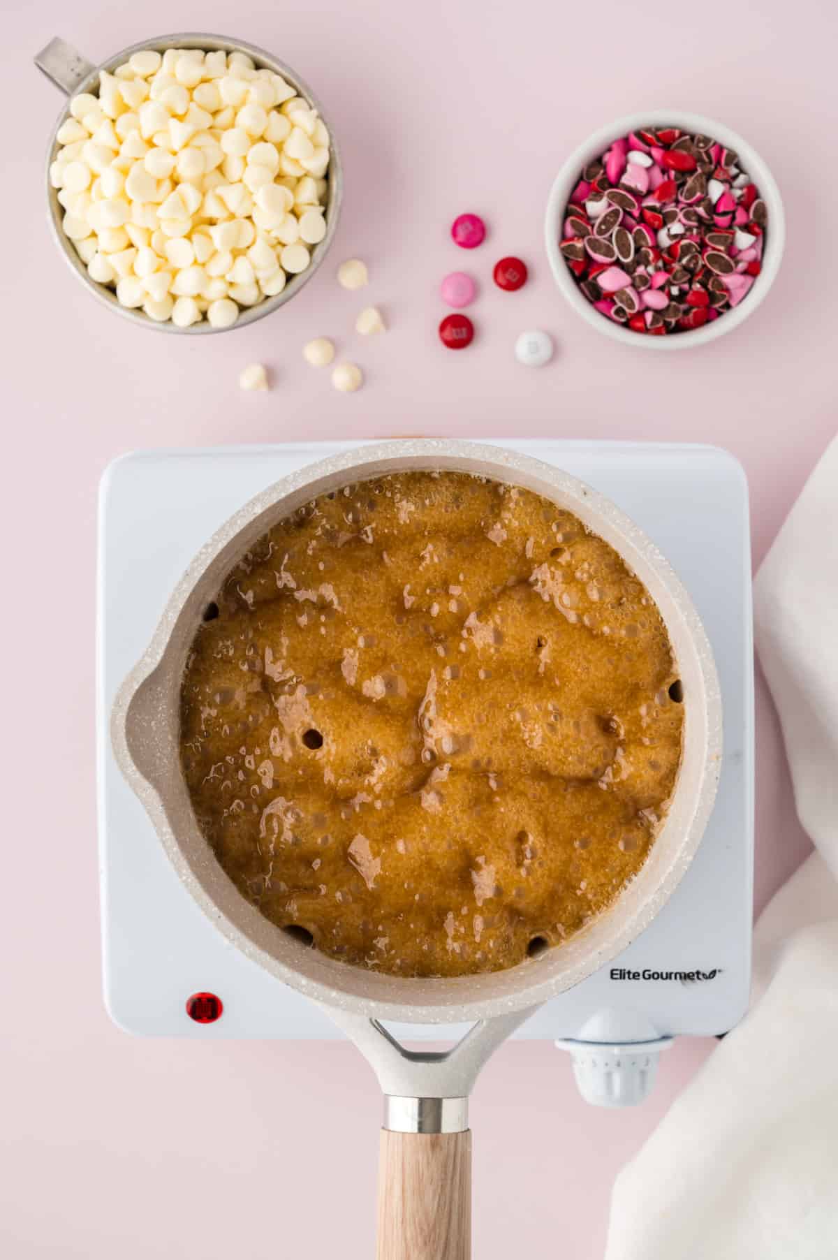 Boiling toffee in pot.