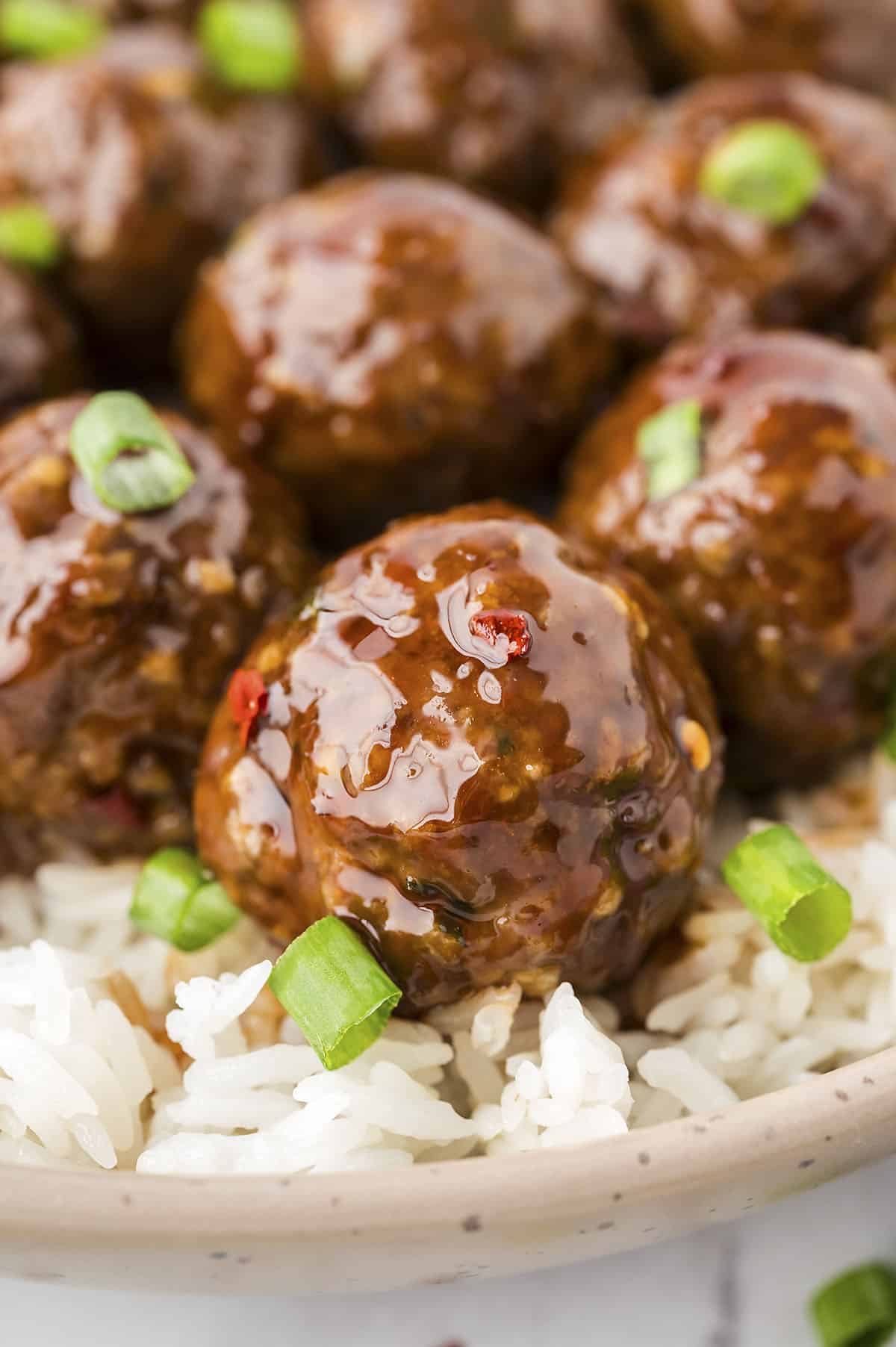 Meatballs on bed of rice.