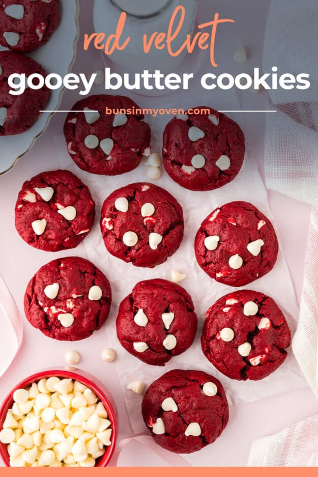 Overhead view of red velvet cake mix cookies on parchment paper.